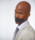 Businessman, portrait and tape on mouth silence or corporate censored for secret, blackmail or quiet. Black person, face Royalty Free Stock Photo