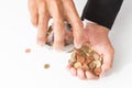 Businessman pouring coins fromn the glass to his hand, concept of saving  money for finance accounting, growing business Royalty Free Stock Photo