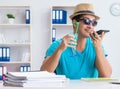 Businessman preparing for vacation in the office Royalty Free Stock Photo