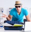 Businessman preparing for vacation in the office Royalty Free Stock Photo