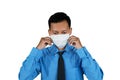 Businessman preparing by wearing medical mask