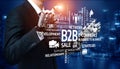 Businessman Presenting B2B Concepts with Sales Strategies, Network Development, and E-commerce Solutions in a Modern Royalty Free Stock Photo