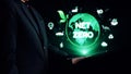 Businessman presenting a digital globe with net zero concept symbolizing sustainability and environmental responsibility Royalty Free Stock Photo