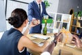 Businessman presenting gifts to colleagues Royalty Free Stock Photo