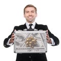 Businessman presenting a suitcase full of one hundred US dollars