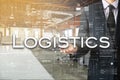 Businessman is presenting text: Logistics