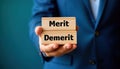 Businessman presenting wooden blocks with merit, demerit. Pro business concept. Evaluating decision, pros, cons of plan. Business