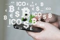 Businessman presses currencies button on phone ICO Initial Coin Offering on virtual electronic user interface account.