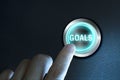 Businessman pressing button goals on virtual screen Royalty Free Stock Photo