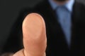 Businessman pressing control glass of biometric fingerprint scanner, closeup. Royalty Free Stock Photo