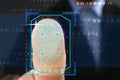 Businessman pressing control glass of biometric fingerprint scanner, closeup