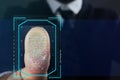 Businessman pressing control glass of biometric fingerprint scanner, closeup with space for text. Royalty Free Stock Photo