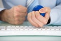 Businessman Pressing Stressball Royalty Free Stock Photo