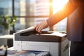 Businessman print paper on a multifunction laser printer in business office. Document and paperwork. Secretary work. Copy, print,