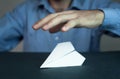 Businessman protect paper airplane. Royalty Free Stock Photo