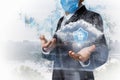 Businessman in protective mask shows clouds secured in the network connections Royalty Free Stock Photo