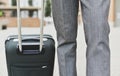 Businessman pulling a trolley case Royalty Free Stock Photo