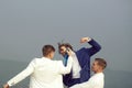 Businessman punching, hitting colleague, twin men in formal outfit Royalty Free Stock Photo