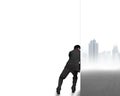 Businessman push away cityscape wall Royalty Free Stock Photo