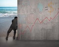 Businessman push doodles concrete wall away