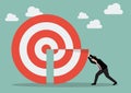 Businessman pushing missing piece in big target Royalty Free Stock Photo