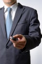 Businessman pushing remote a car key