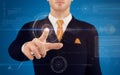 Businessman pushing on a touch screen button Royalty Free Stock Photo