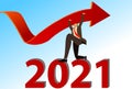 Businessman pushing upwards a business chart arrow on 2021 number