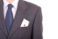 Businessman putting ace card in his pocket. Royalty Free Stock Photo