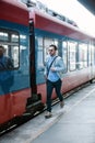 Businessman on railroad station Royalty Free Stock Photo