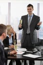 Businessman raising toast with champagne