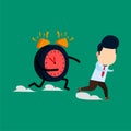 Businessman running from clock monsters Royalty Free Stock Photo