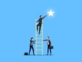 Businessman reaching the star with other helps. Teamwork and trust concept Royalty Free Stock Photo