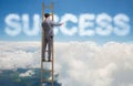 Businessman reaching success with career ladder Royalty Free Stock Photo