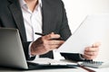 Businessman reading agreement documents