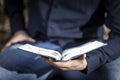 Businessman reading the bible Royalty Free Stock Photo