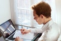 Businessman reading contract or filling tax form Royalty Free Stock Photo