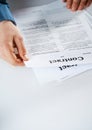 Businessman reading through a contract Royalty Free Stock Photo