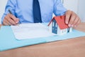 Businessman reading a contrat before signing it Royalty Free Stock Photo