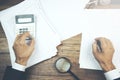 Businessman reading documents with  analyzing a finance agreement Royalty Free Stock Photo