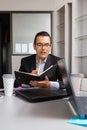 businessman reading documents to employees, boss in a meeting room Royalty Free Stock Photo