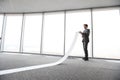 Businessman reading long paper list