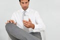 Businessman reading message on smartphone Royalty Free Stock Photo