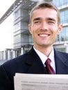 Businessman reading newspaper Royalty Free Stock Photo