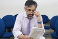 Businessman Reading Newspaper