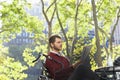 Businessman Reading Newspaper In Park Royalty Free Stock Photo