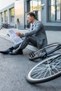 Businessman reading newspaper while sitting on Royalty Free Stock Photo