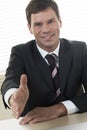 Businessman ready to shake hands Royalty Free Stock Photo