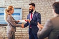 Businessman receiving award from businesswoman Royalty Free Stock Photo