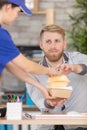 businessman receiving delivery food in office